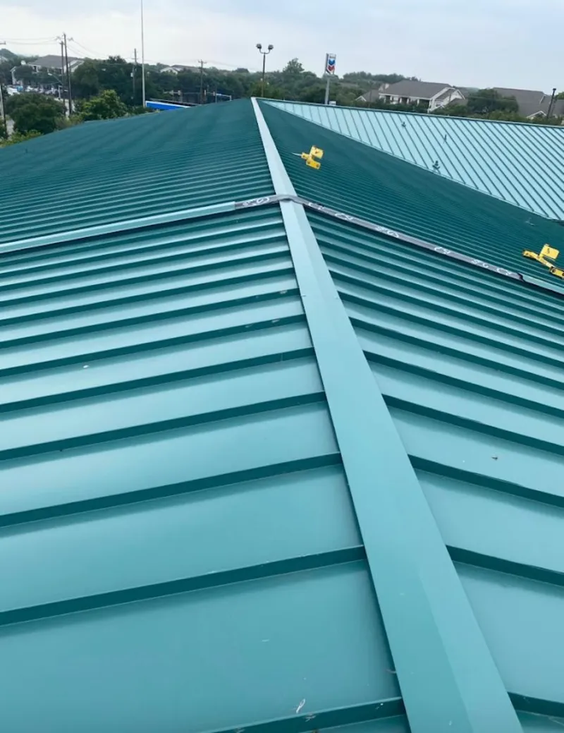 Green commercial metal roof ridge and valley for Metal Roof Repair in Newport